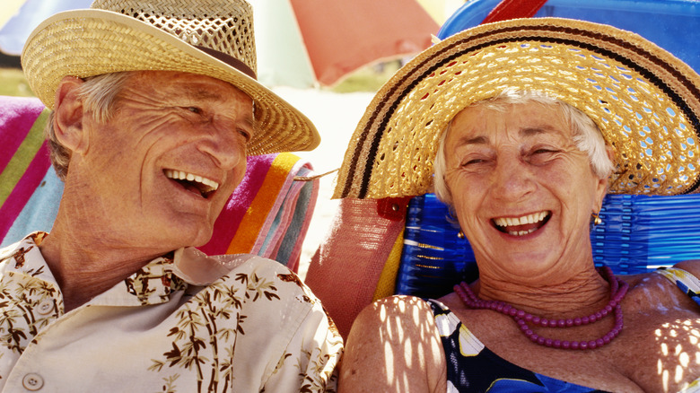 couple wearing straw hat