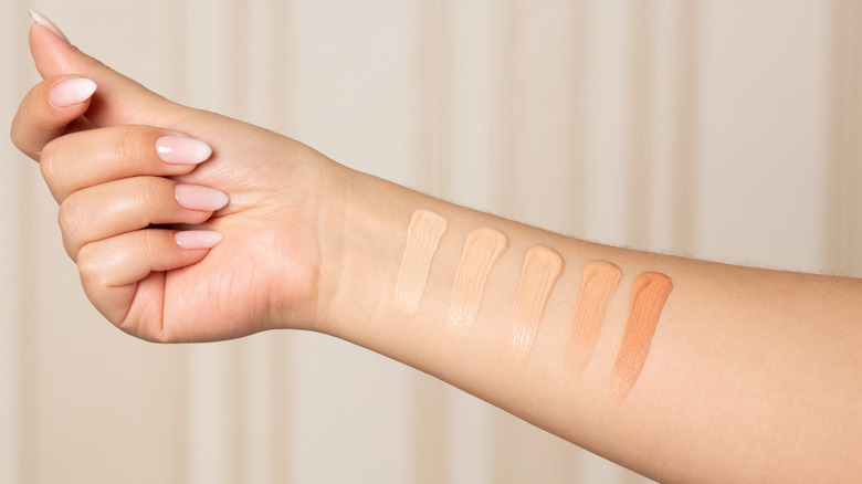 Arm with different foundation swatches