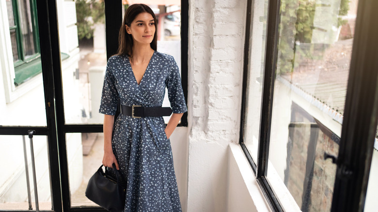 Girl wearing a dress with a belt