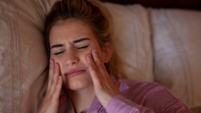 Woman with tooth pain