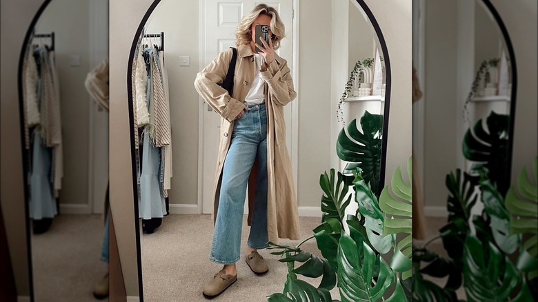 Woman takes mirror selfie wearing clean Birkenstocks