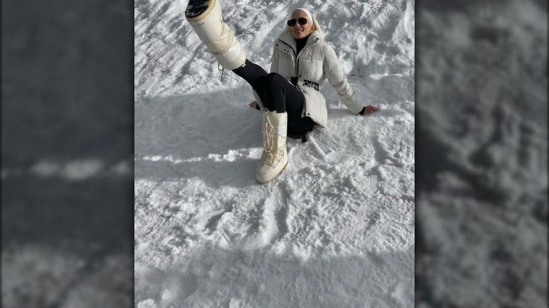 woman sitting in snow