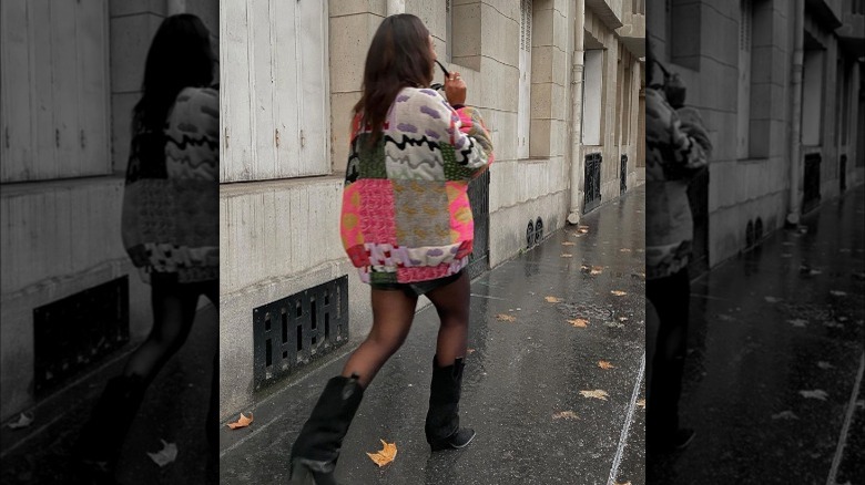 woman wearing puffer cowboy boots