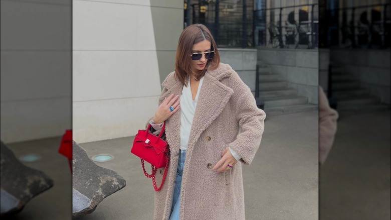 girl wearing a brown teddy coat