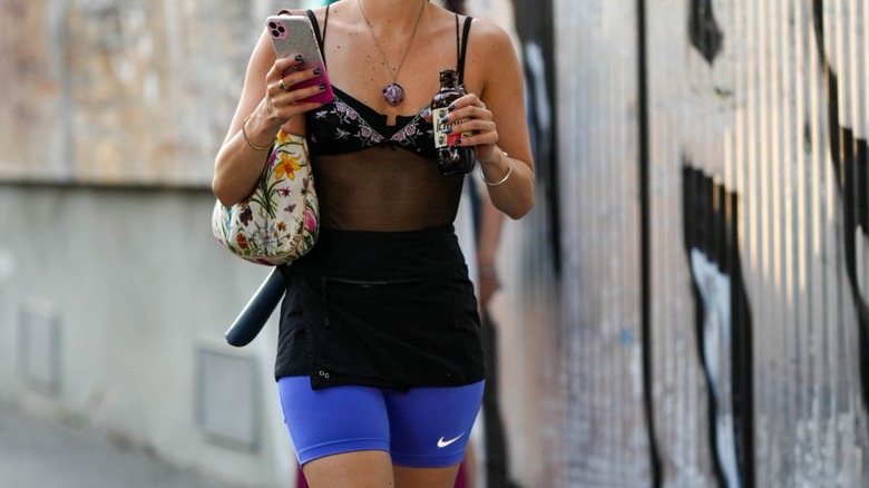 Woman wearing blue biker shorts