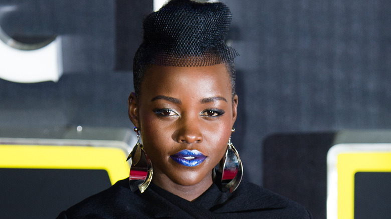 Lupita Nyong'o wearing blue lipstick