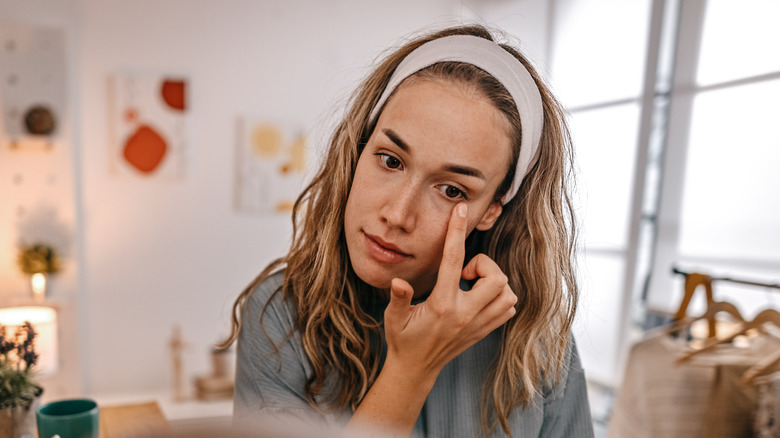 Woman with puffy undereyes