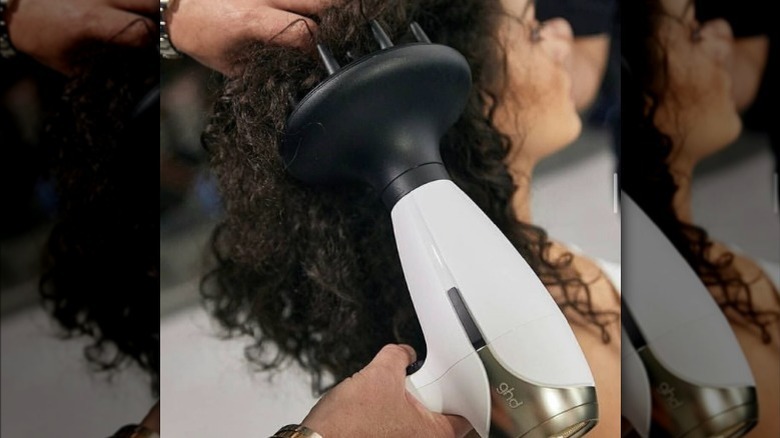 lady getting her hair done with diffuser