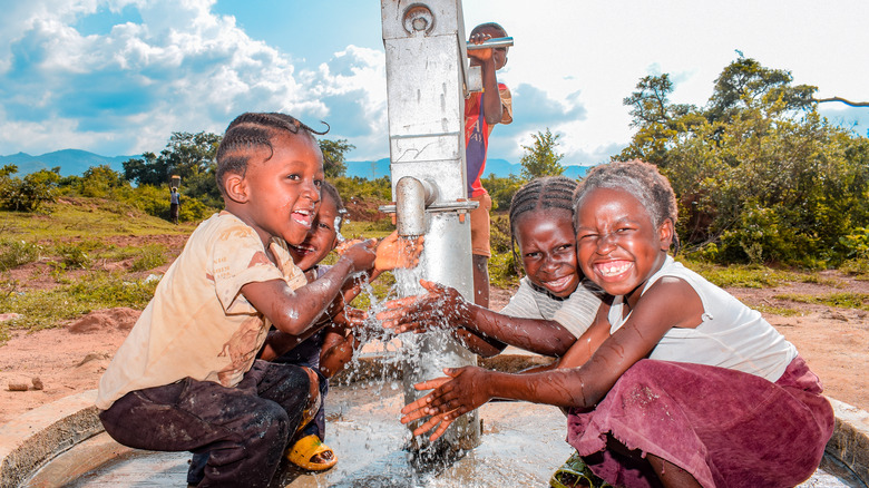 African children playing in a well