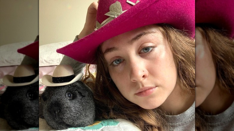 Chappell Roan and guinea pig wearing hats