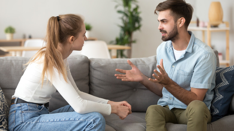 Couple engaging in serious discussion 