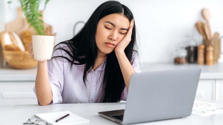 Very tired young woman