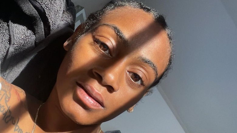 Sha'Carri Richardson taking makeup-free selfie