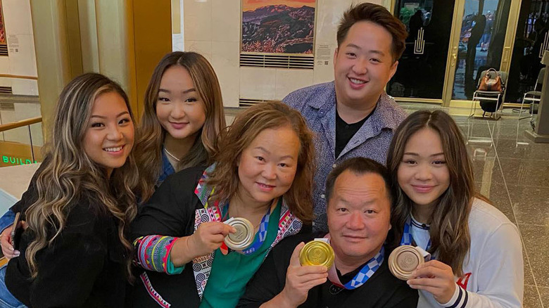 Suni Lee with family Olympic medals