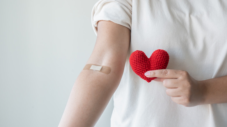 bandage on arm after blood donation