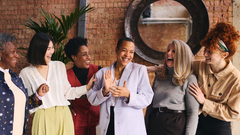 group of women laughing together