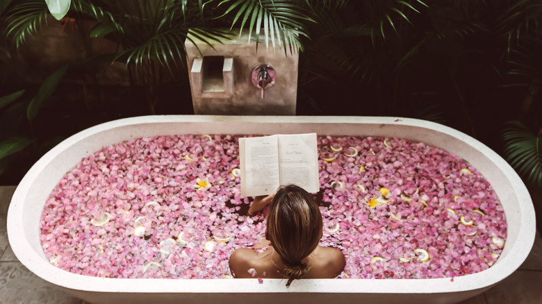 Woman taking relaxing bath