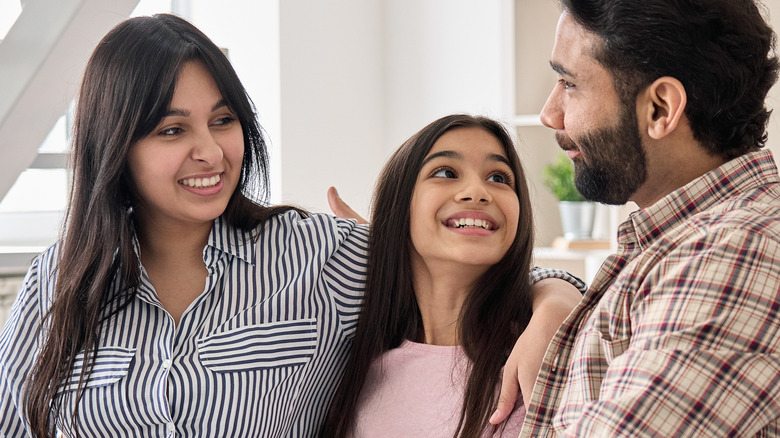 a couple and their daughter