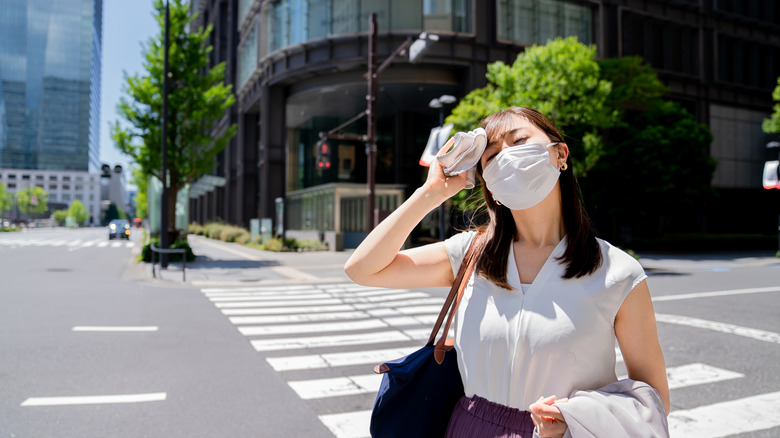 Woman looking irritated in the heat