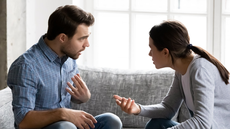 unhappy couple arguing