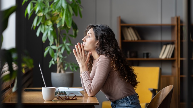 woman sitting alone