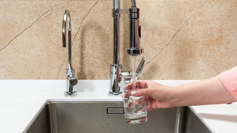 glass being filled with water