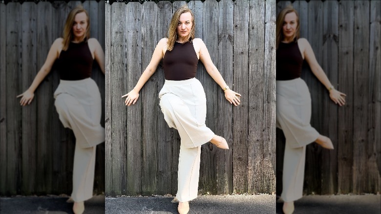 Woman posing in her backyard