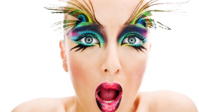 Person wearing rainbow eye makeup