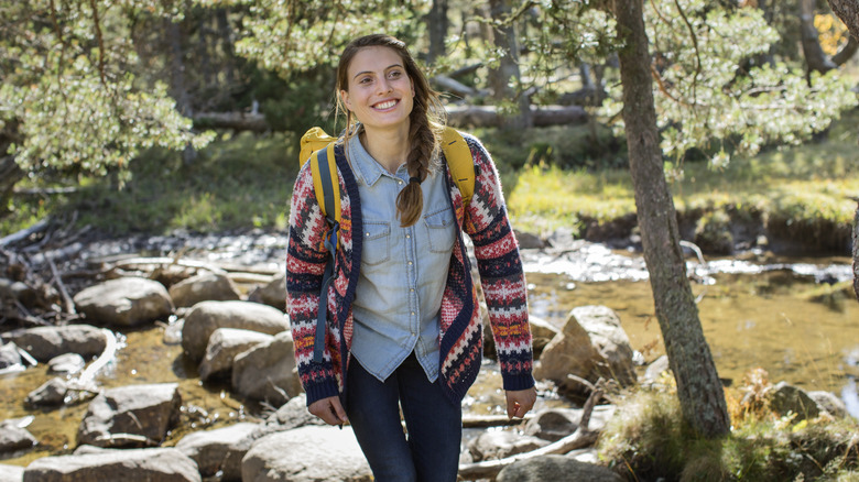 woman walking and smiling