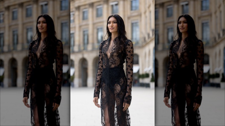 woman wearing lace dress over bikini 