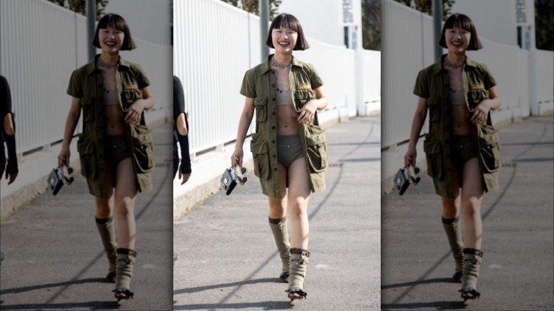 woman wearing cargo shirt with briefs