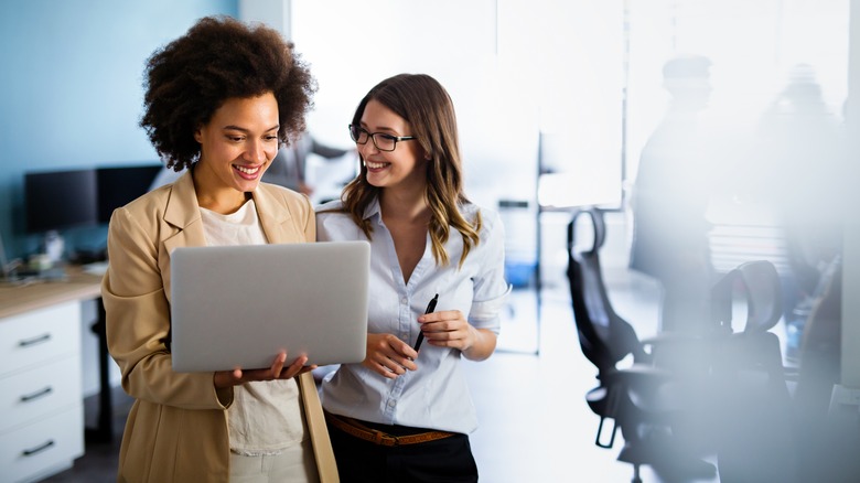 women talking at work