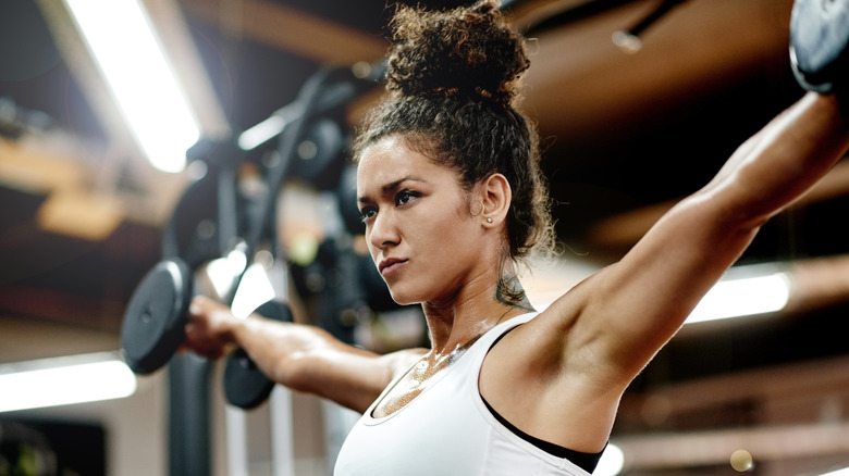 woman lifting weights