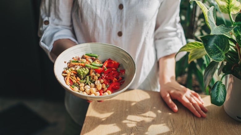 woman holding bowl