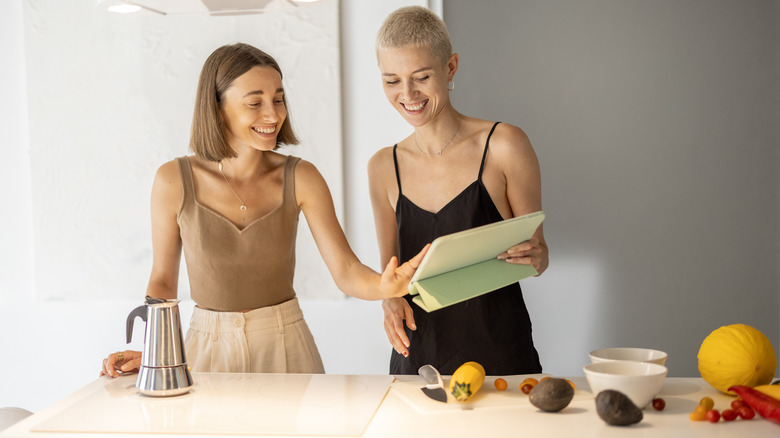 Couple looking at recipe online