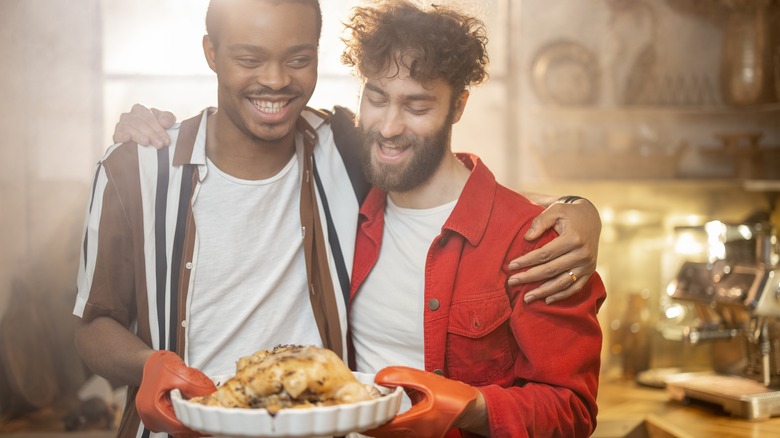 Couple admiring their homemade meal