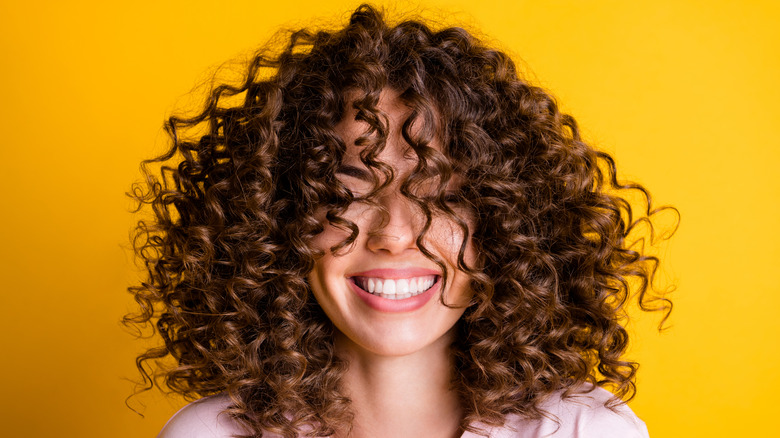 Woman with curly hair