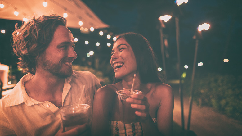 young laughing couple on a date