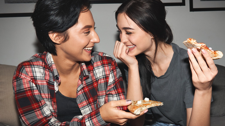 Couple eating and laughing