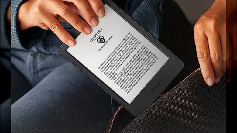 Amazon Kindle in hand