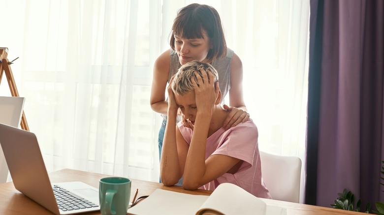 woman consoling upset partner