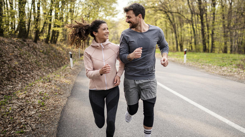 couple running together outside