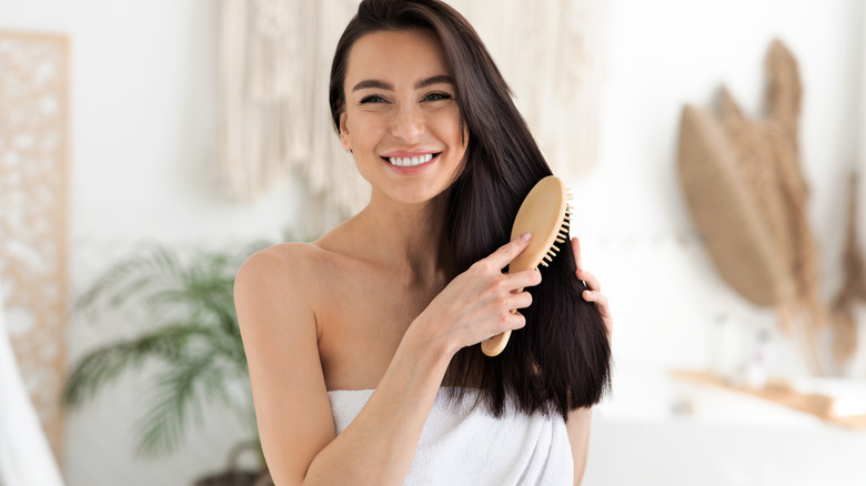 Woman brushing her hair