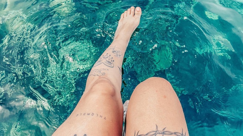 just keep swimming wave tattoo
