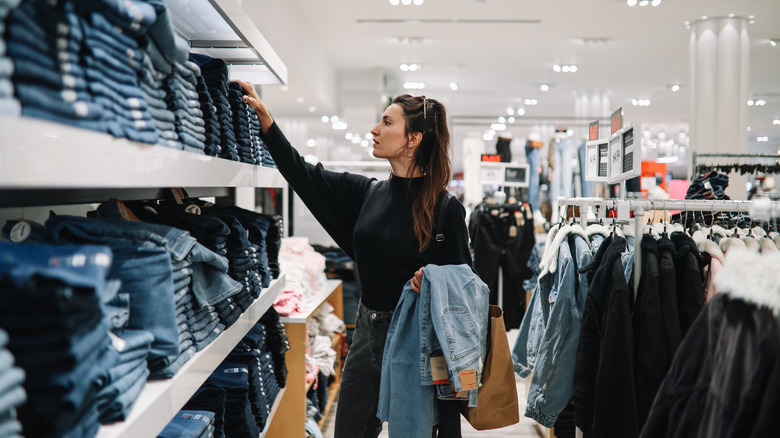 Girl shopping for jeans