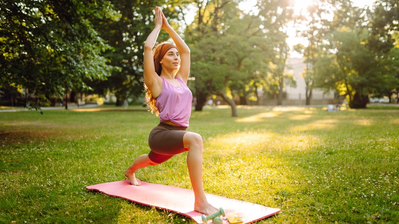 Woman balancing in yoga pose