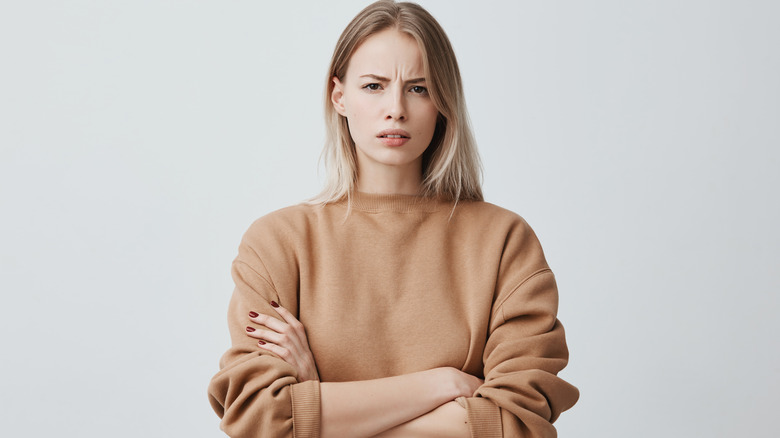 angry woman with arms crossed