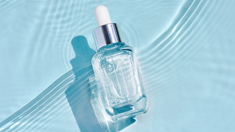 serum bottle surrounded by water