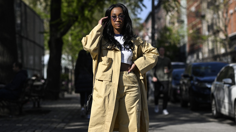 African American woman wearing a long cargo coat