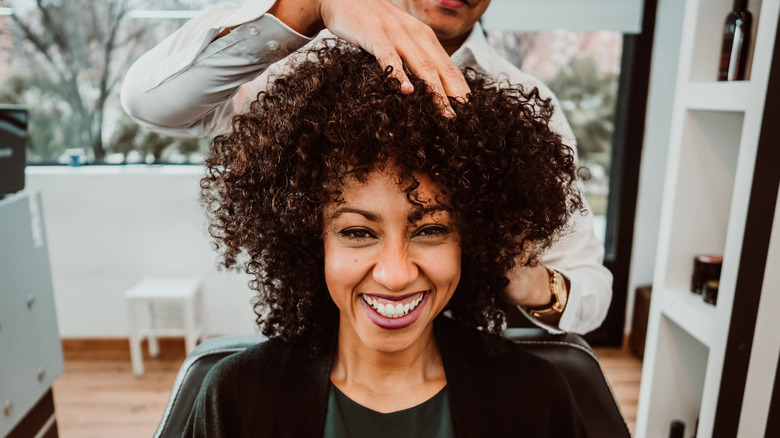 Woman getting her hair fixed.